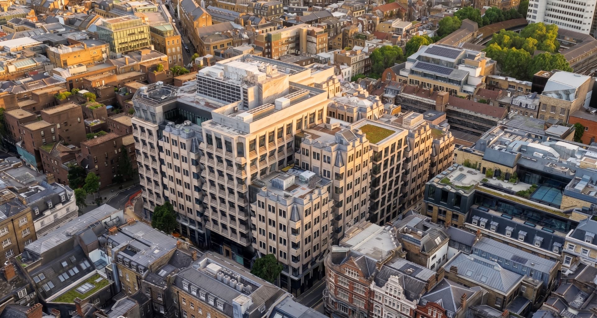 Aerial view of The Acre, 90 Long Acre, Covent Garden, London at golden hour